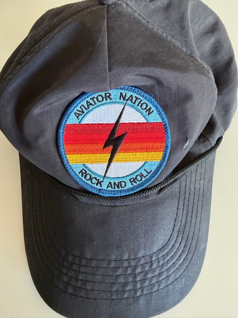 Aviator Nation Black Hat with Red, Orange & Yellow Patch